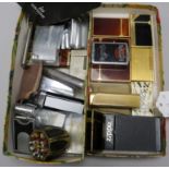 A collection of Dupont 'laque de chine' and other cigarette lighters