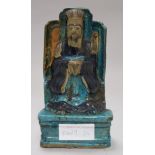 A Chinese Fahua-decorated seated figure of an emperor, Ming dynasty, on a moulded plinth, label