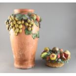 A Clare Sheridan painted plaster vase 15.5in. and a similar fruit group, 9in.https://www.gorringes.