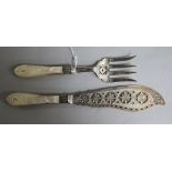 A pair of Victorian mother of pearl fluted handled silver fish servers, Martin, Hall & Co,