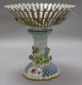 A German floral encrusted fruit bowl, height 24cm