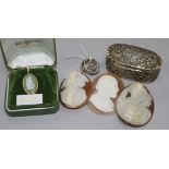 Three rings including 18ct gold and diamond, a silver ring box, three shell cameos and a pendant.