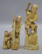 Two Japanese walrus ivory groups, early 20th century, tallest 14.5cm
