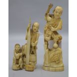 Two Japanese walrus ivory groups, early 20th century, tallest 14.5cm