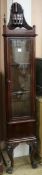 A mahogany glazed corner cupboard, W.40cm