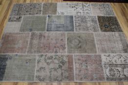 A patch work rug, 220 x 170cm