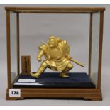 A model of a Samurai warrior in a case