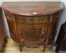 A Louis XVI ormolu mounted and banded kingwood and mahogany 'D' shaped side cabinet W.113cm