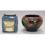 A Troika geometric design cube vase, signed 'AP' and a small Moorcroft vase, red ground, in the