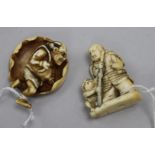 Two Japanese ivory netsuke, 19th century, the first depicting a samurai and a figure crouched at his