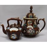 A Bargeware teapot and another, height 36cm and 24cm