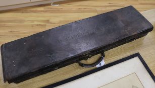 A leather gun case 83cm long, 21.5cm wide