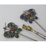 Three metal, glass and enamel hair ornaments