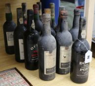 Twelve assorted bottles of port including Warres, 1955(2), Cockburn, 1955(1) (all Wine Society), two