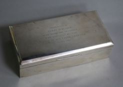 A 1930's silver cigarette box, 17.8cm.