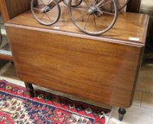 A Victorian mahogany cottage drop leaf dining table W.89cm