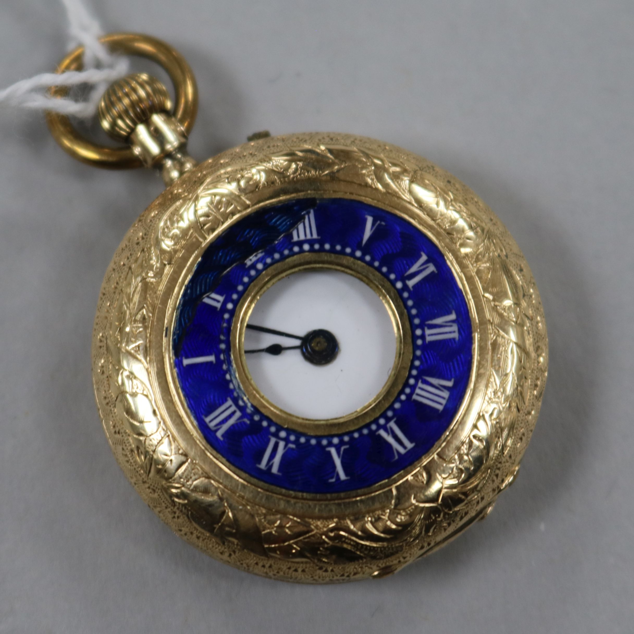 A 14ct gold and blue enamel half hunter fob watch.
