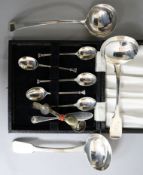 A George III silver sauce ladle, Thomas Tookey two other silver sauce ladles, five silver