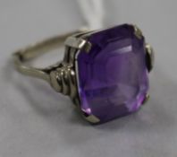 A 1930's/1940's white metal and amethyst dress ring, size M.