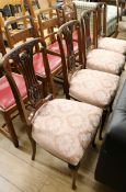 A set of four Georgian style mahogany dining chairs