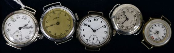 A Longines silver-cased trench-style wristwatch and four other trench style examples, all lacking