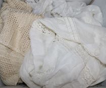 An Edwardian white worked blouse, 1920's silk jumper and two petticoats