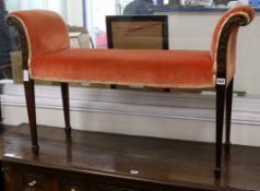 An Edwardian mahogany window stool W.107cm