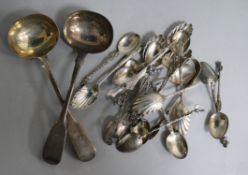 A group of assorted silver flatware including a pair of Victorian silver fiddle pattern sauce