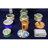 Ten assorted Halcyon Days Enamels boxes including a timepiece