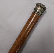 A white mounted tippling stick