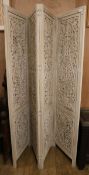 An Indian four fold white painted screen each section W.50cm