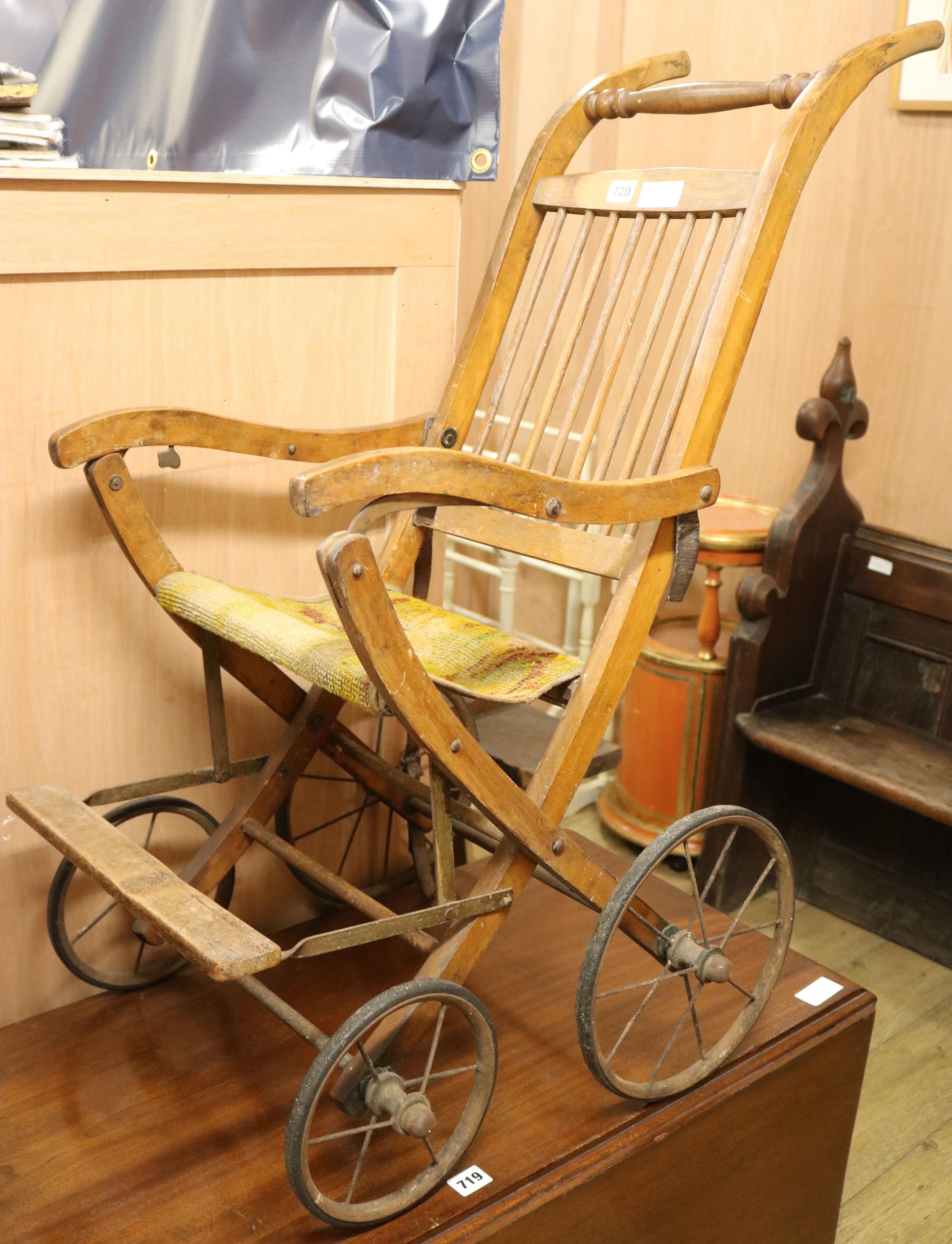 An Edwardian folding wood pram