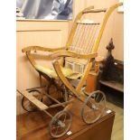 An Edwardian folding wood pram