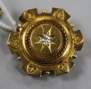 A Victorian 15ct gold and diamond set brooch, 31mm.