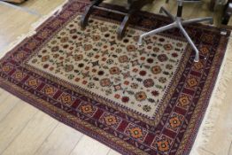 An Indian ivory ground rug 170 x 130cm