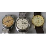 A gentleman's steel Omega Constellation wrist watch and two other watches.