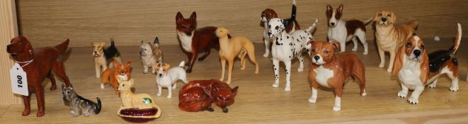 A collection of Beswick dogs