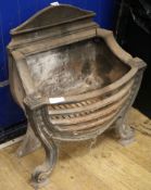 A cast iron fire grate W.56cm