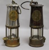 Two miner's lamps, height 23cm