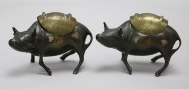 A pair of Chinese bronze, silver and copper decorated 'ox' censers and covers
