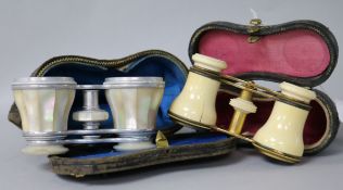 Two cased pairs of opera glasses