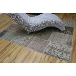 A patchwork rug 173 x 218cm