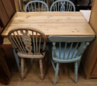 A pine kitchen table and four chairs table W.105cm