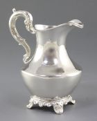 An early Victorian silver cream jug, by William Hunter, hallmarked London, 1856, of plain, shaped