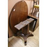 A 19th century Continental oval topped dining table W.129cm