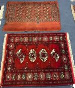 A small red ground mat and another 109cm x 78cm, 103cm x89cm