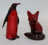 A Royal Doulton penguin and fox