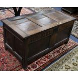 A 17th century oak coffer w.122cm