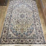 A Isfahan part silk rug 215cm x 130cm