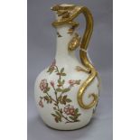 A Royal Worcester blush ground jug with serpent handle (a.f.)